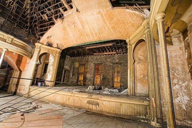 Showing progress of reconstruction on opera house and stage of Antoinette Hall